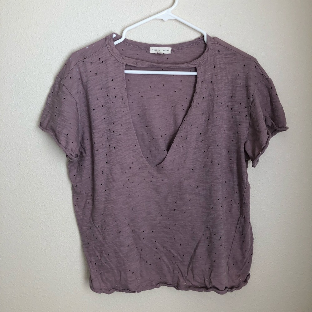 Shredded cut open shirt